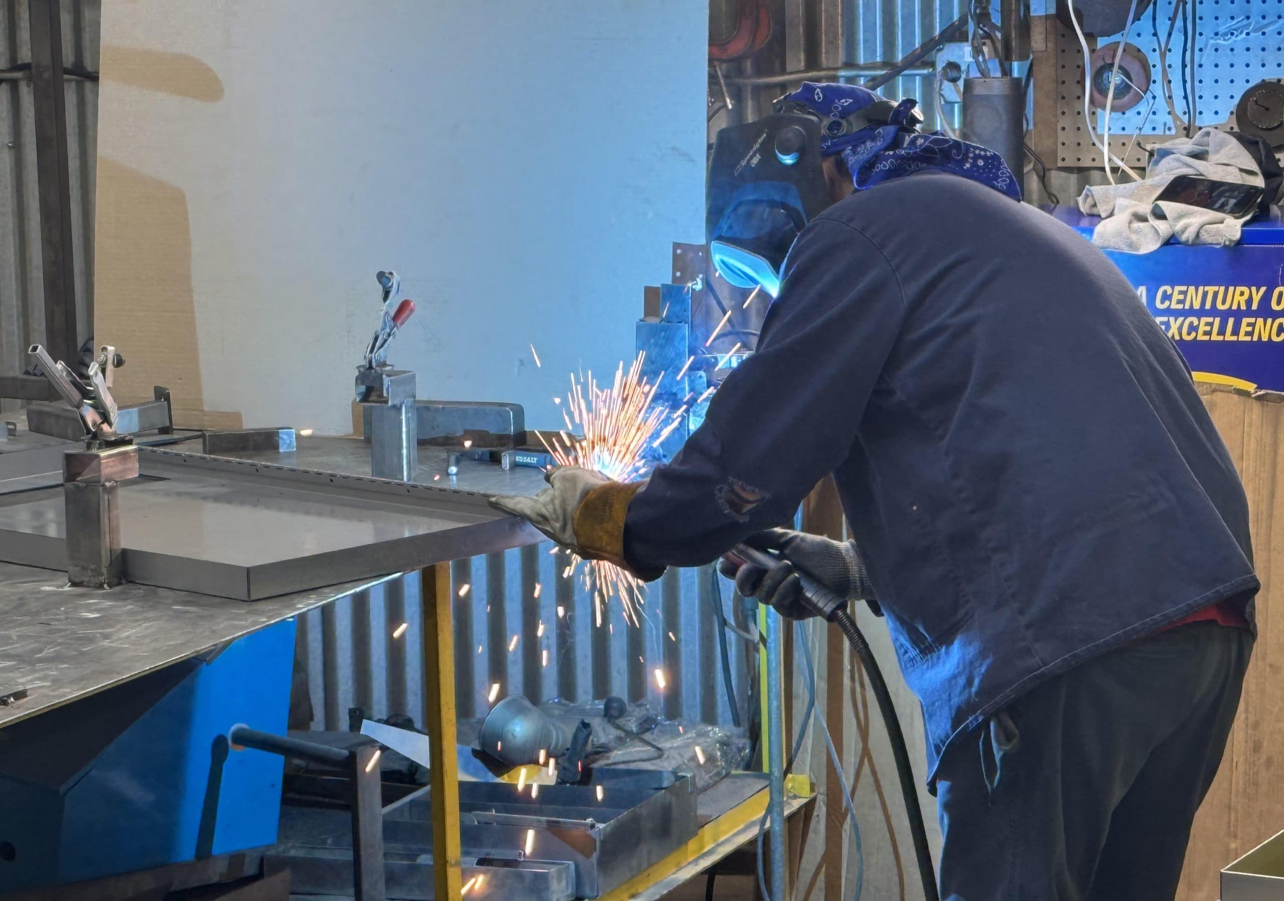 K-Display welder fabricating a sheet-metal assembly